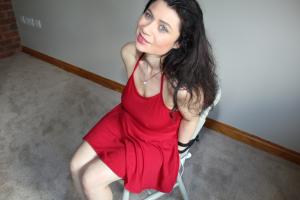 www.boundkathy-friends.com - Sue tied to chair in her red dress thumbnail