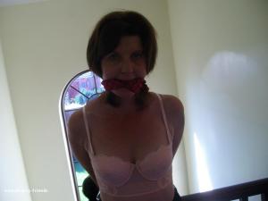 www.boundkathy-friends.com - Cheryl tied to stairpost thumbnail
