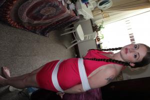 www.boundkathy-friends.com - Rosie tape bound in red dress thumbnail